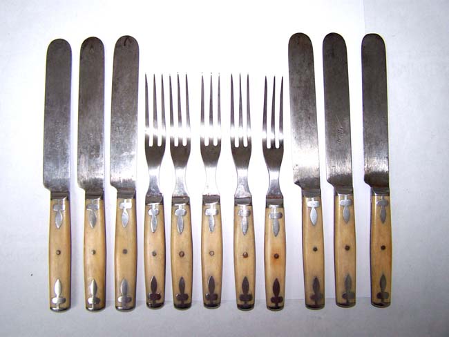 A set of late 19th Bone Handled Forks and Knives